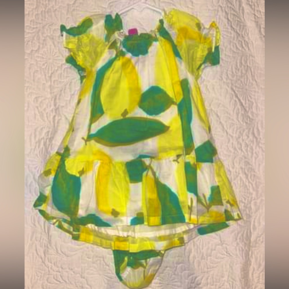 9-12 month Tea Collection lemon dress and matching diaper cover.